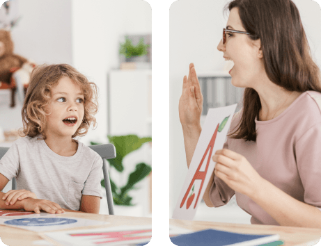 Speech therapist teaching letter pronunciation to a young boy in a classroom